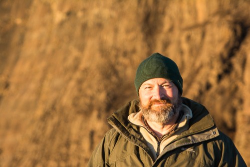 Gary at sunrise at Sentinel Peak in the Drakensburg