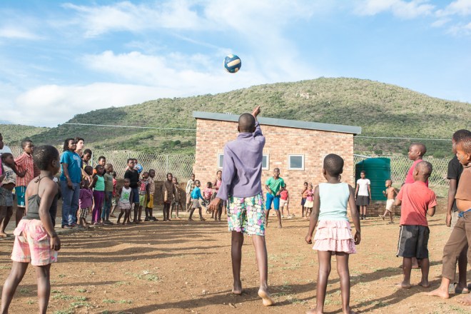 The kids enjoying a game of volleyball at Youth Club